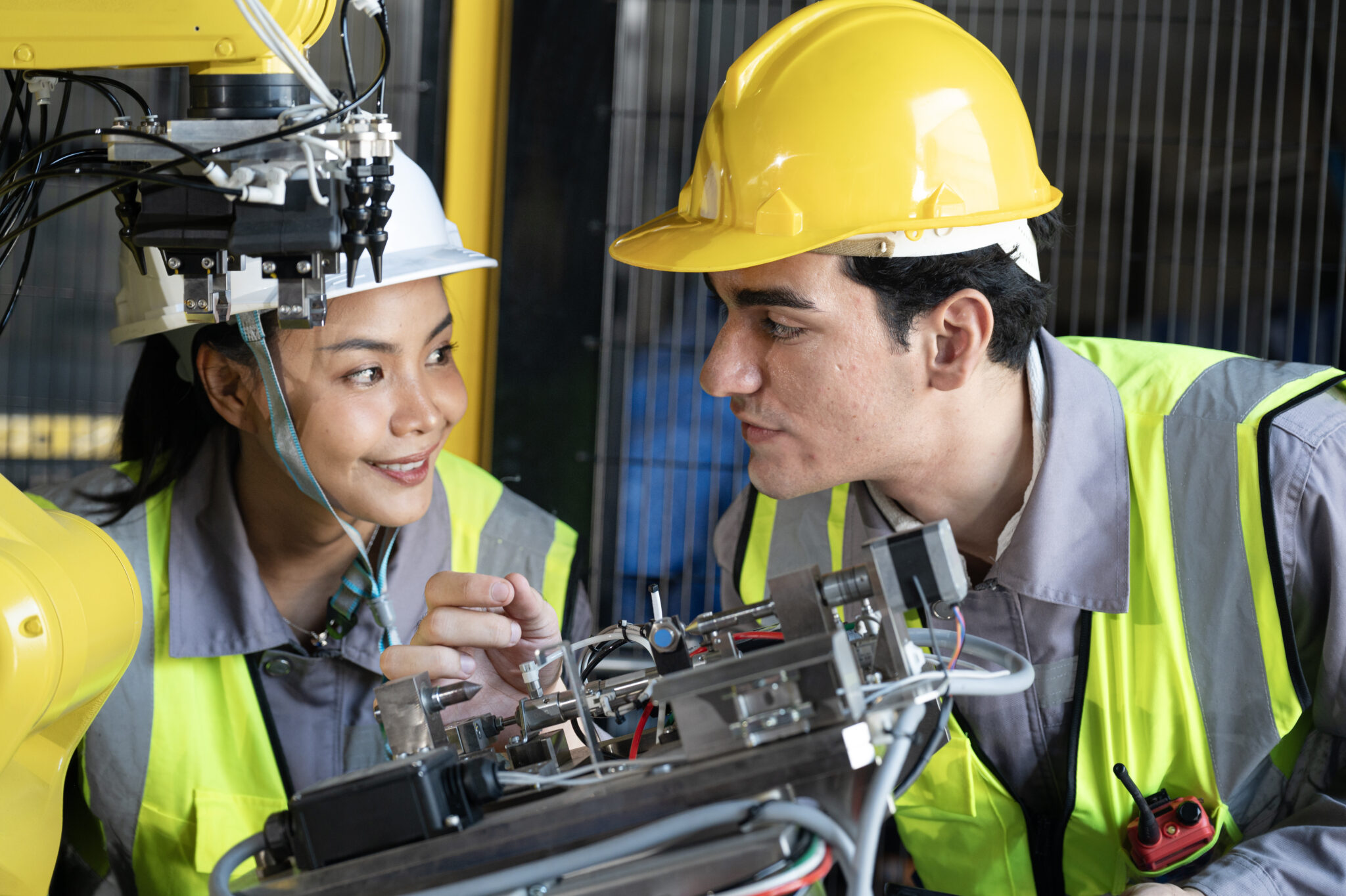 Industrial engineers teamwork inspection factory robotics safety focus
